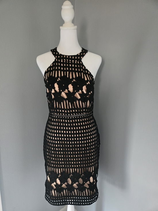 Lulus Dresses & Skirts - Lulu's Black Crochet Lace Halter Mini Dress with Nude Lining